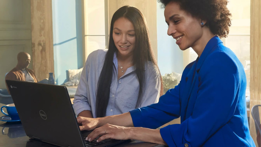 Woman works on Chromebook